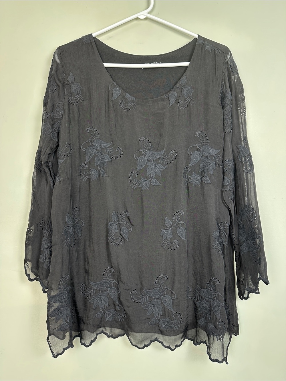166. Italy, silk, long sleeve black floral embroidered top.